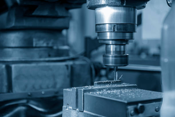 istock The slot cutting  process on NC milling machine with flat end mill tools. 1992730278
