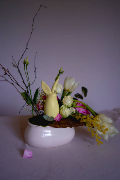 istock Easter flower arrangement with a ceramic rabbit in a minimalist style 1992756046