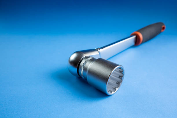 istock Ratchet wrench on blue background 1992817416