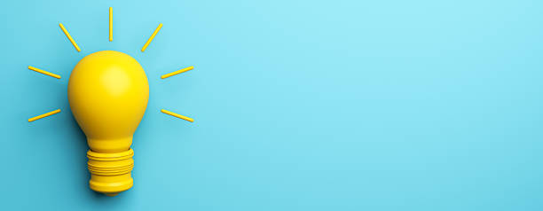 istock Abstract yellow light bulb on wide blue background with mock up place. Idea, creativity and innovation concept. 3D Rendering. 1992836499