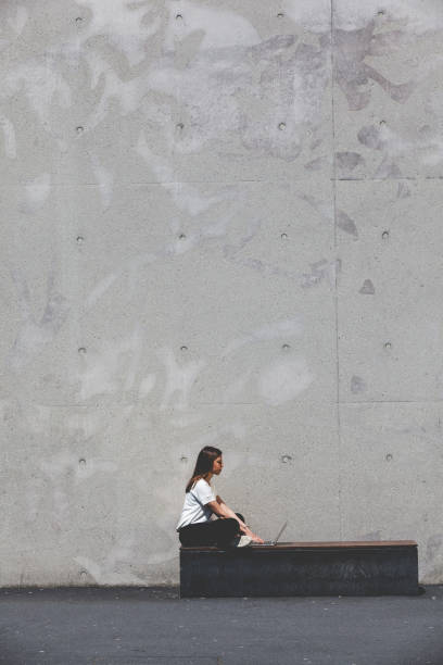 istock young woman working with laptop 1992877370