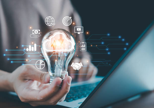 istock Man hand holding Light bulb. Business global internet connection application technology and digital marketing, infographic, laptop, cloud, work, Financial and banking, Digital link tech, Big data. 1992892522