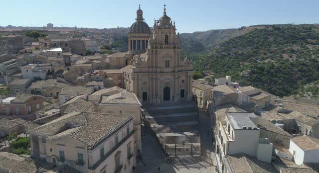 Ragusa Ibla, the baroque jewel of Sicily, with the Cathedral of San Giorgio seen from an aerial perspective.