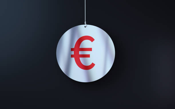 istock Red Euro Sign on white note paper hanging on string on black background Black background 1992910014