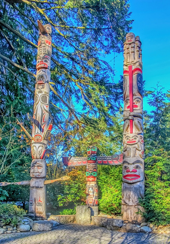 Vancouver, British Columbia, Canada. Feb 6, 2024. The Capilano Suspension Bridge Park hosts a distinguished totem pole exhibit that highlights monumental carvings indigenous to the western Americas.