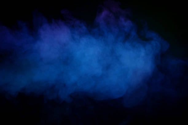 istock Blue and green steam on a black background. 1992957606