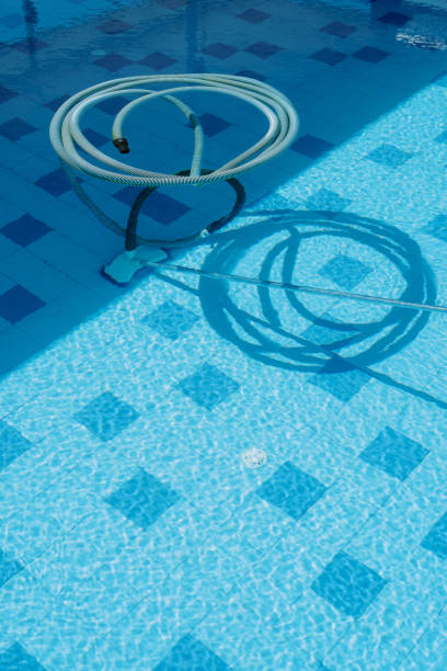 istock Bottom vacuum cleaner for cleaning underwater works in the pool 1992975594