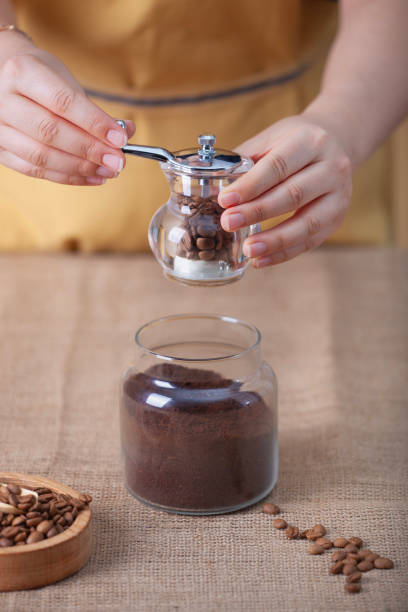 istock Grinding coffee beans in a manual coffee grinder 1993035761