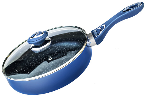 New, modern, large, heavy duty Royal Blue non-stick Stainless Steel WOK frying pan, with glass lid, spotted black double coated ceramic inner surface, and handle with chrome details, isolated on white background, side view.