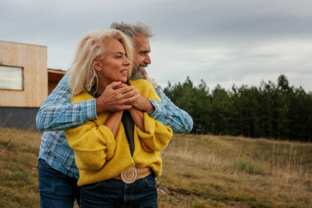 istock Senior couple bonding in afternoon walk. 1993108425