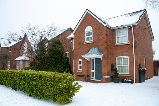 Snowy scenes in Wilmslow, Cheshire. A blanket of fresh snow transforms the landscape into a winter wonderland.