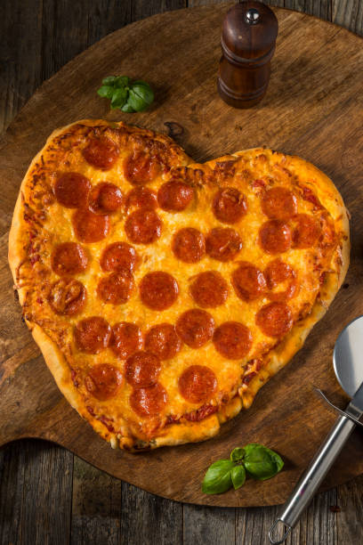 istock Heart Shaped Pepperoni Pizza for Valentines Day 1993137799