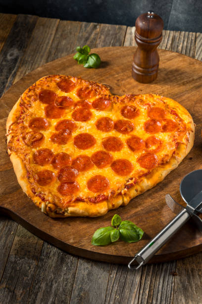 istock Heart Shaped Pepperoni Pizza for Valentines Day 1993138314