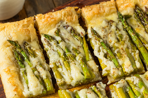 Homemade Baked Puff Pastry Asparagus Tart with Cheese for an Appetizer