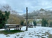 Frozen Feast: A Serene Picnic Setting in the Snowy Mountains