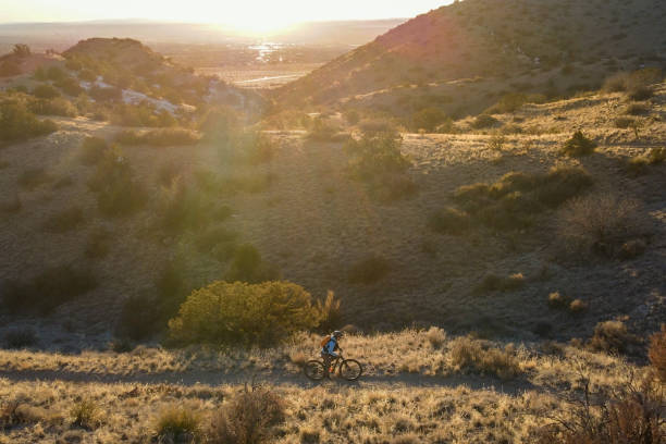 istock nature inspiration sunset mountain biking 1993178895