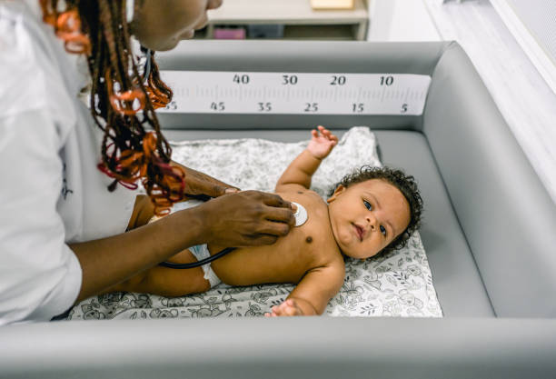 istock Pediatrician examining baby 1993179415