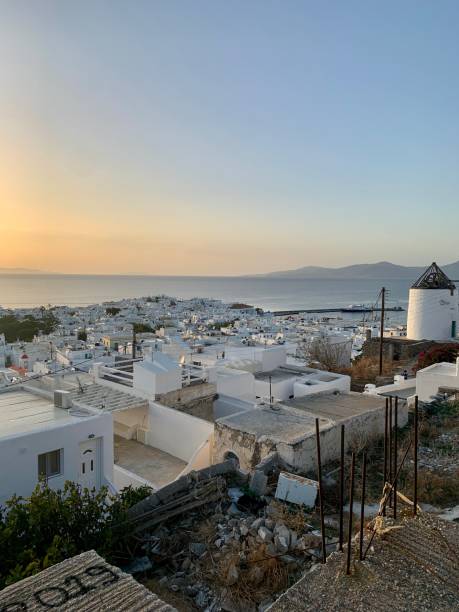 Amazing sunset view, Mykonos island, Cyclades, Greece. Beautiful scenery with Mediterranean colors in a beautiful day Amazing sunset view, Mykonos island, Cyclades, Greece. Beautiful scenery with Mediterranean colors in a beautiful day cultura grega stock pictures, royalty-free photos & images