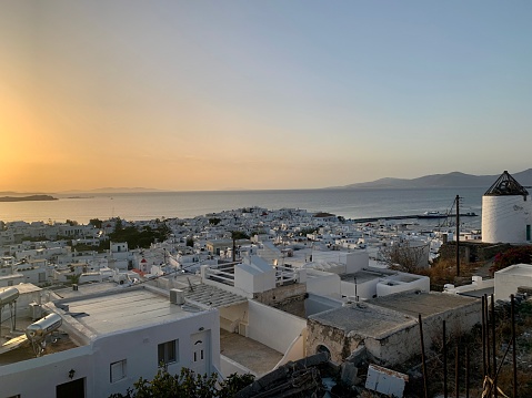 Amazing sunset view, Mykonos island, Cyclades, Greece. Beautiful scenery with Mediterranean colors in a beautiful day