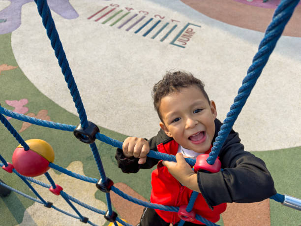 360+ Boy On Swing In The Park Stock Photos, Pictures & Royalty