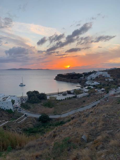 Amazing sunset view, Mykonos island, Cyclades, Greece. Beautiful scenery with Mediterranean colors in a beautiful day Amazing sunset view, Mykonos island, Cyclades, Greece. Beautiful scenery with Mediterranean colors in a beautiful day cultura grega stock pictures, royalty-free photos & images