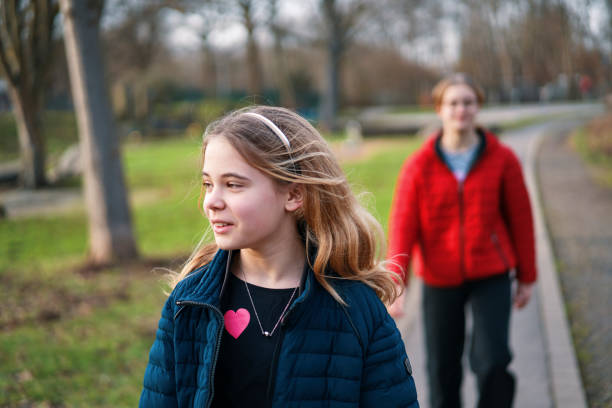 istock Young Teens Enjoying Nautre in the Park 1993195119