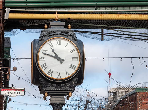 Close up of a clock face distillery district