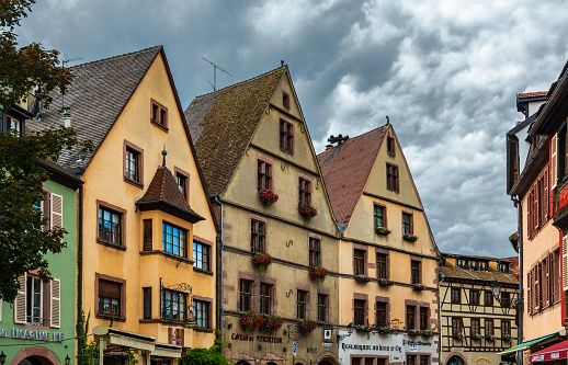 Traditional half-timbered houses and the River Weiss in the village of Kayserberg in Alsace, France, Vosges, Mountain