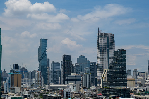 Bangkok Thailand Skyline: Skyscrapers Architecture Against Blue Sky