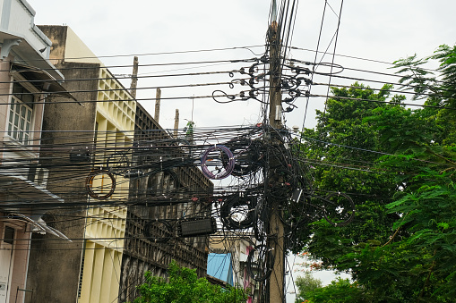Urban Electricity Infrastructure Complexity: Tangled Electrical Wires in Thailand's City