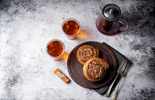 Cinnamon roll buns in a plate. toning
