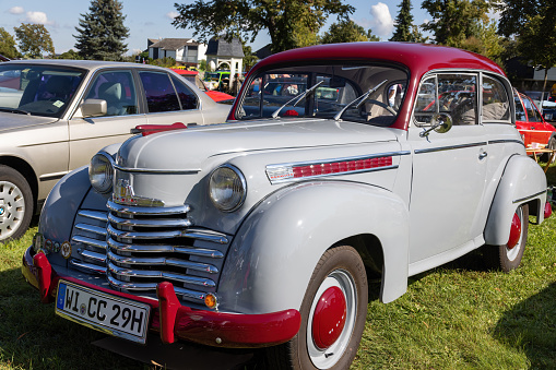 Weiterstadt, Germany September 24, 2023: Opel Olympia in red / gray at Chromblitz in Weiterstadt at Braunshardt Castle