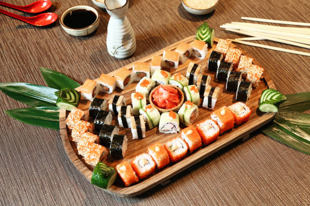 istock Wooden Tray With Sushi and Chopsticks 1993253163