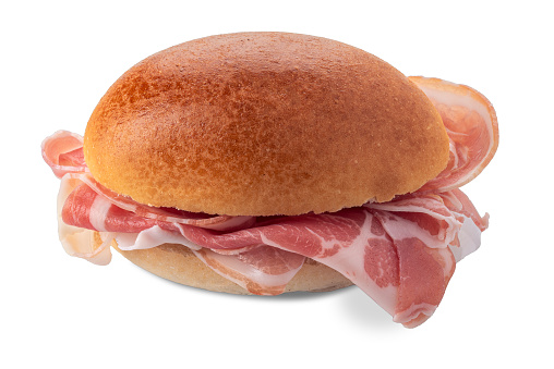 Sandwich with slices of bacon salami, bun stuffed with slices of bacon isolated on white with clipping path included