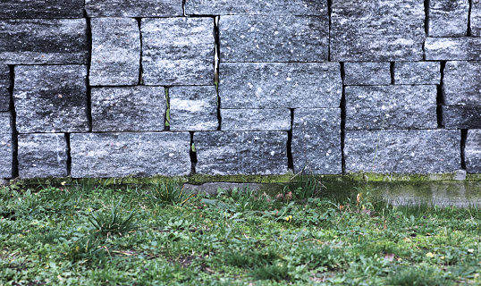 Stone wall placed with square stones