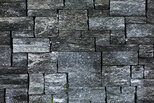 Stone wall placed with square stones