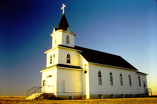 A prairie Lutheran Church in Saskatchewan in 1996. From old film stock.