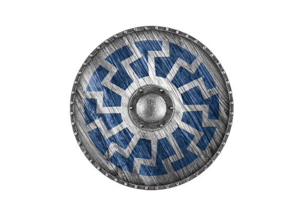 Old decorated wooden round shield isolated on white background