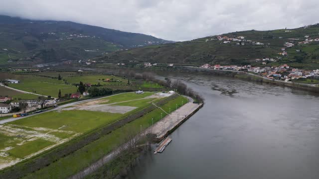 Douro riverbank and pier in Peso da Regua - aerial panoramic