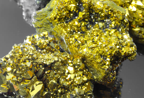 istock golden rocks of many sizes with glittering reflections 1993322469