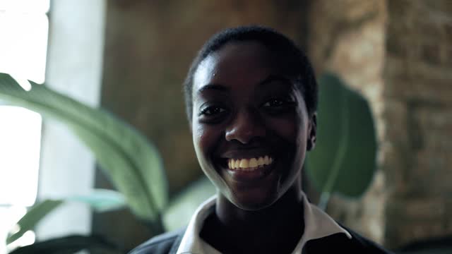 Young business woman smiling in the camera