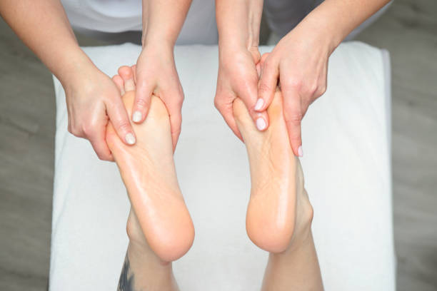istock Four hands massage, lags feet treatment in spa salon 1993387937