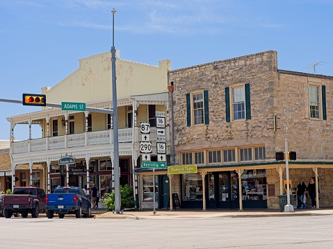 Fredericksburg, TX - USA, April 28, 2023. Shopping district at route 16 and 87 in the Texas Hill country town of Fredericksburg.