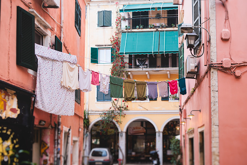 Corfu street view, Kerkyra old town beautiful cityscape, Ionian sea Islands, Greece, a summer sunny day, pedestrian streets with shops and cafes, architecture of historic center, travel to Greece