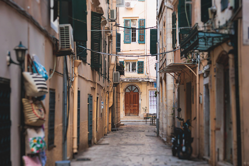 Corfu street view, Kerkyra old town beautiful cityscape, Ionian sea Islands, Greece, a summer sunny day, pedestrian streets with shops and cafes, architecture of historic center, travel to Greece