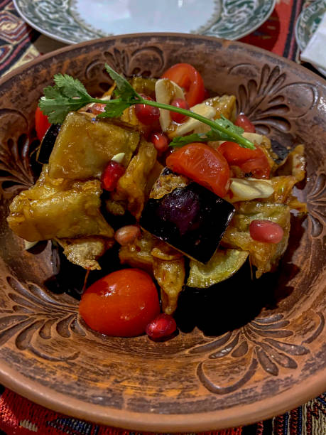 istock Vegetable stew with aubergine, eggplant and tomatoes 1993596526