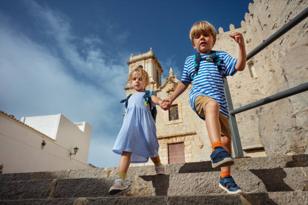 istock Small travelers do sightseeing in sunny Peniscola, Spain 1993614616
