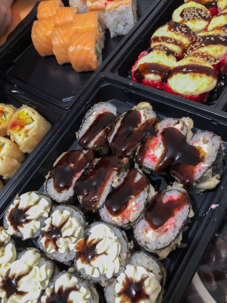 istock Sushi in a plastic box, Japanese food, close-up 1993620882
