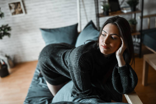 istock Female In Love Day Dreaming About Her Crush While Resting On Home Sofa 1993628749