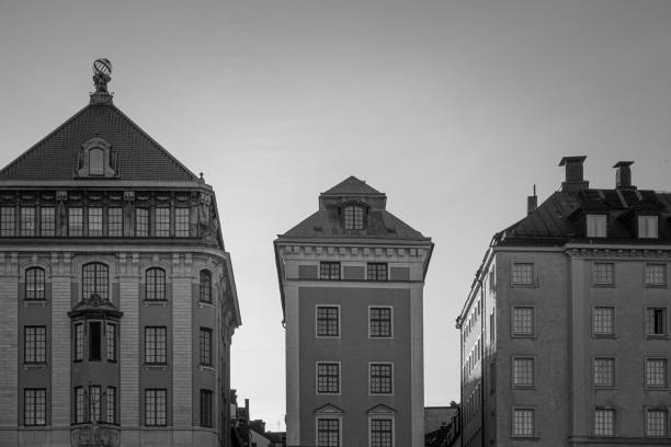 istock Low angle view of buildings against clear sky 1993729409